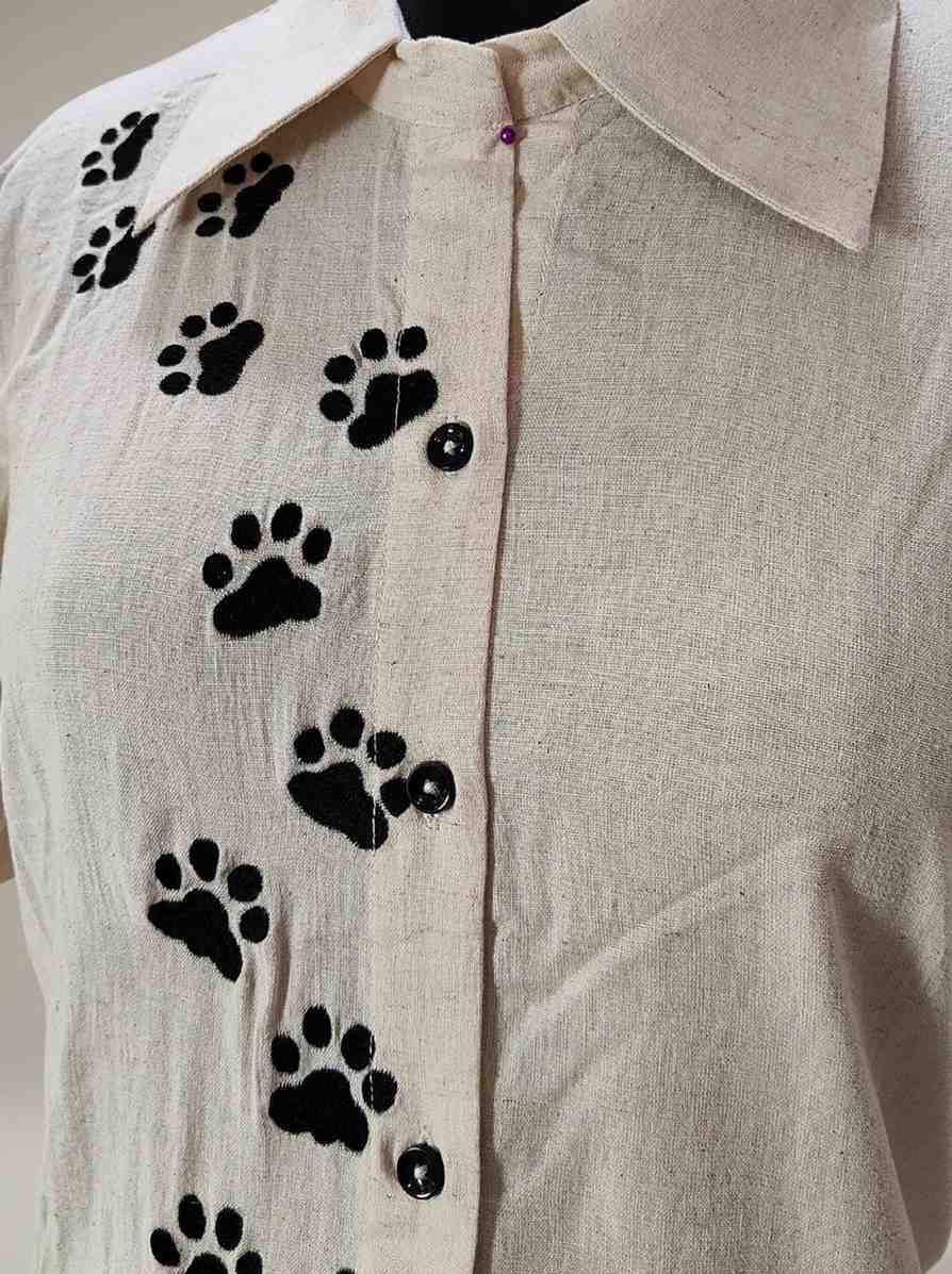 Beige with black cat